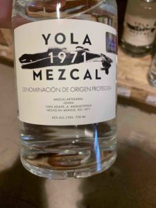 The front label of a bottle of Yola Mezcal.