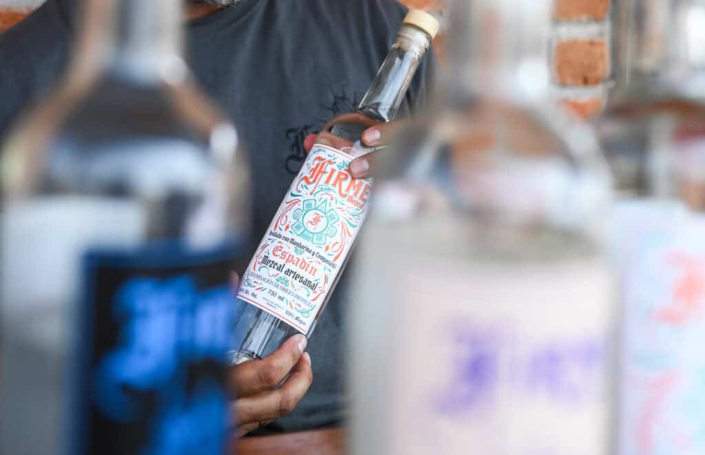 A bottle of Firme Mezcal 