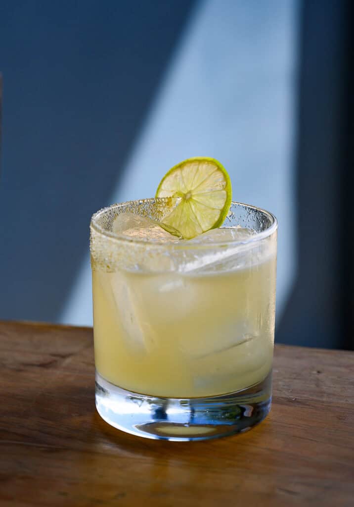 A mezcal margarita with a garnish