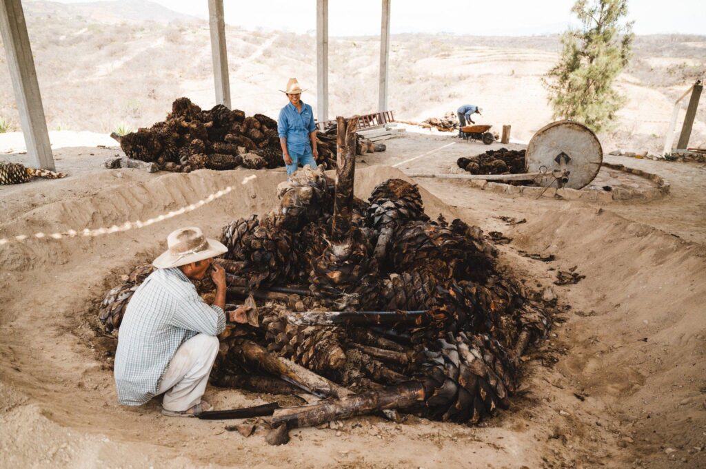 Agave roasting at a Oaxacan mezcal palenque