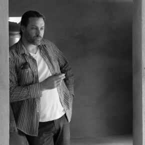 Bar owner Ryan Fitzgerald of ABV in San Francisco is standing in a doorway